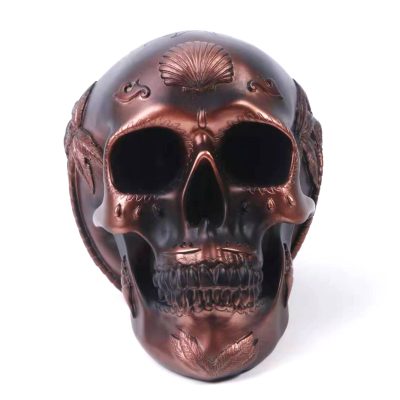 Pusculita craniu decorativ din rasina, model bronz
